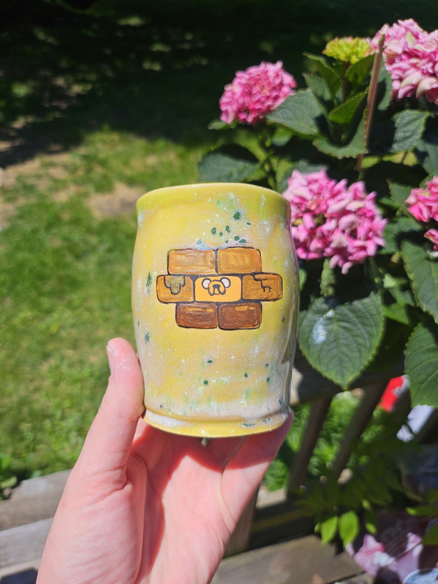 A Jake the Brick Cup in Lime