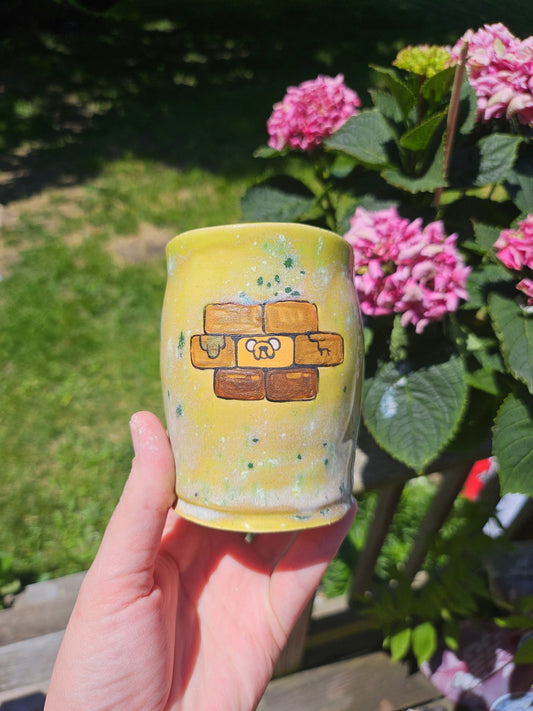 A Jake the Brick Cup in Lime
