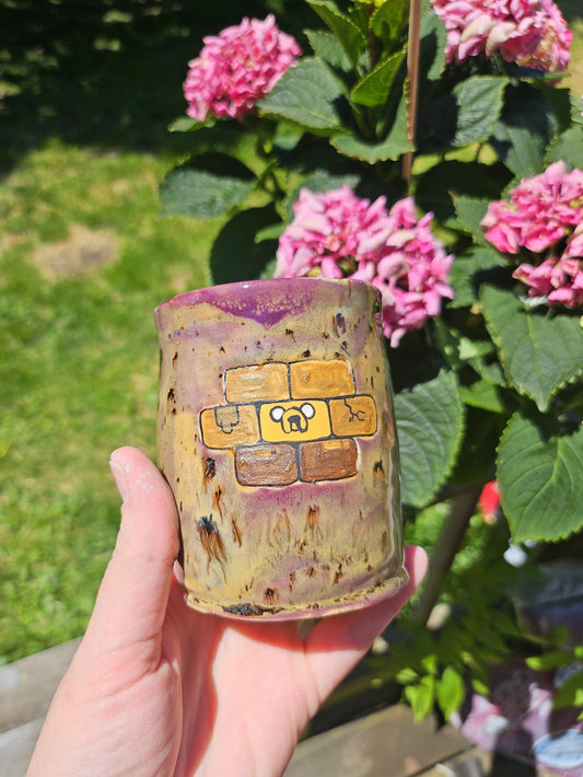 A Jake the Brick cup in Eggplant